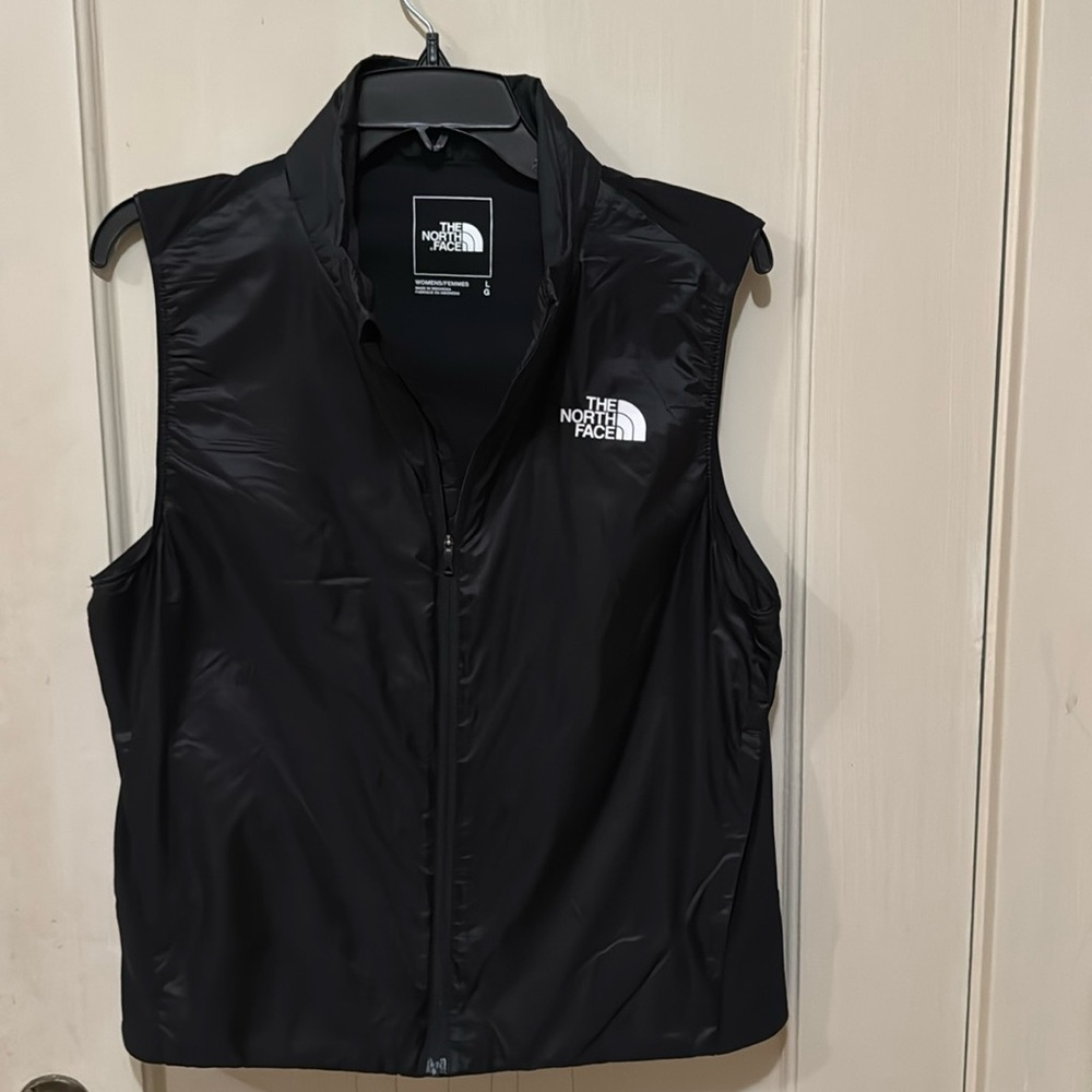 Women’s black North Face vest, size large (fits like medium). Lightweight.